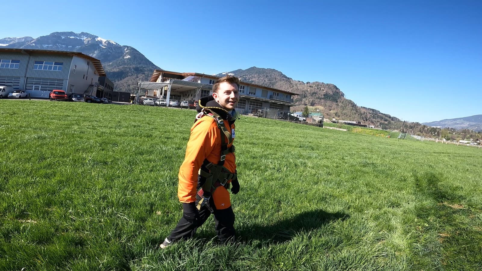Jackson in skydiving gear, Swiss Alps